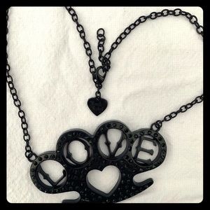 Brass knuckle necklace